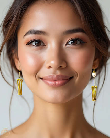 Mismatched pearl earrings