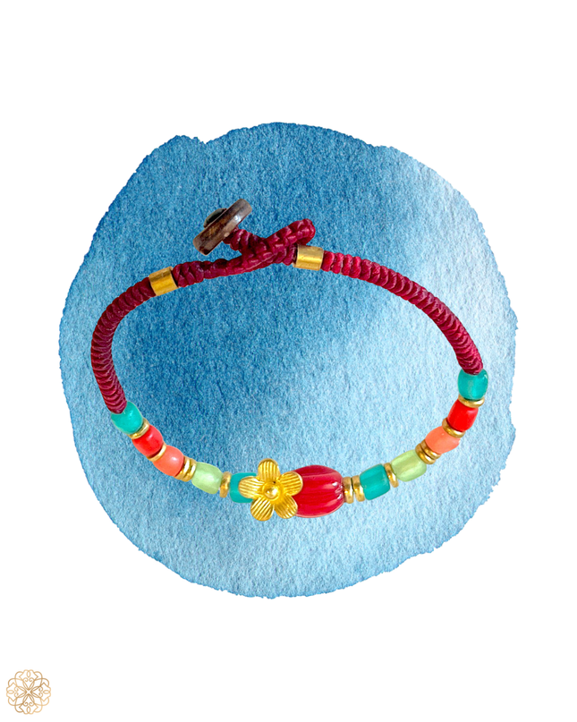 Richly colored beaded bracelet with flower charm - Sundara Joon