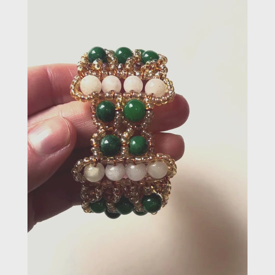 Hand beaded jade bracelet with a nod towards art deco with crystal and seed beads added for visual flare. We think the designers are genious and we got the only one they created in this pattern - a work of art and one of a kind.